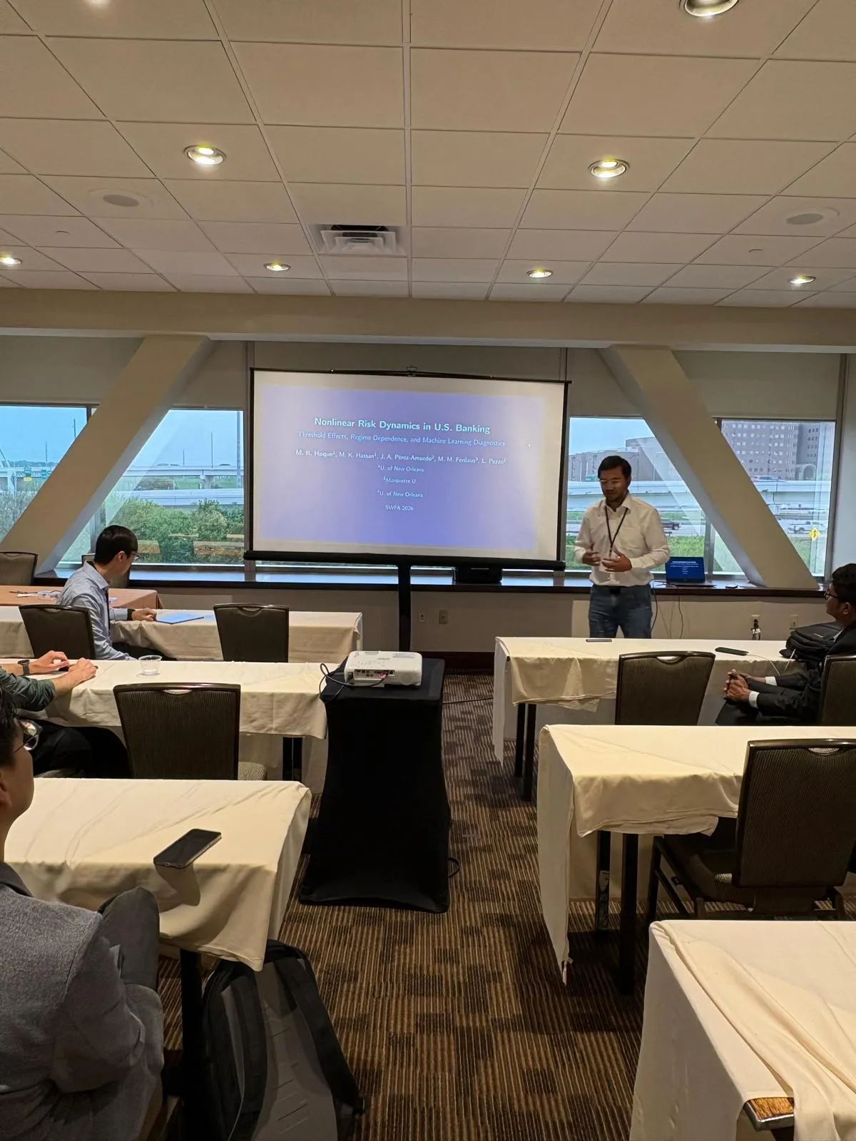 M. R. Hoque presenting a paper on U.S. banking at SWFA 2026